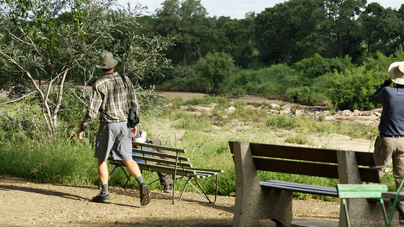 Leg stretch at a guarded viewpoint